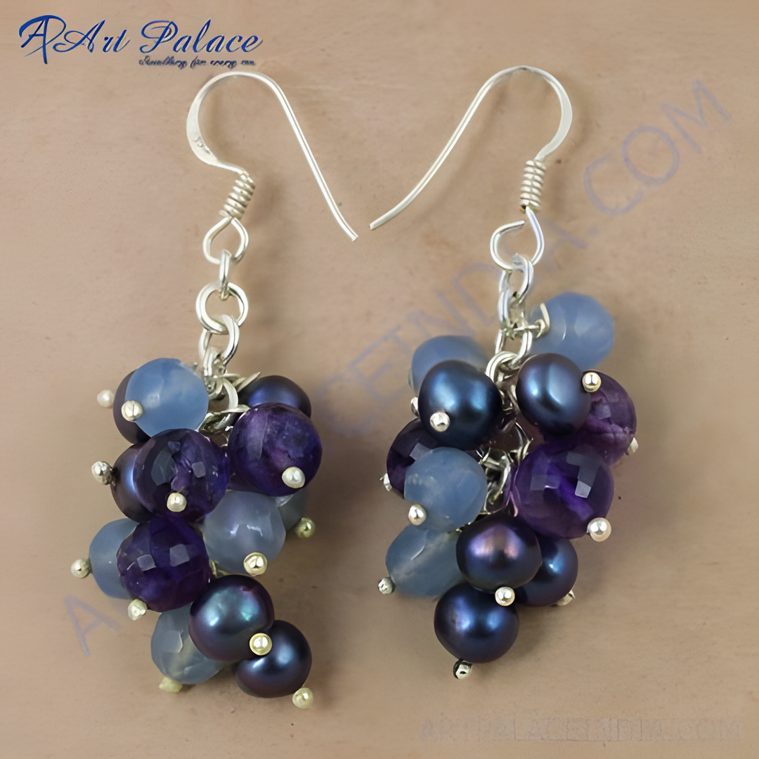 Silver cluster earrings featuring pearls and blue and purple gemstones, elegant fashion jewelry.