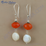 Load image into Gallery viewer, 925 sterling silver dangle earrings with orange gemstones and white pearl drops.
