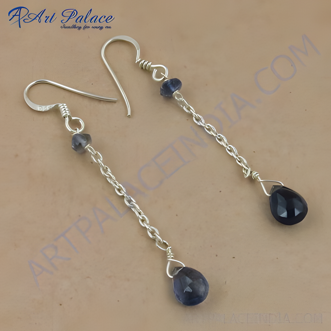 925 sterling silver drop earrings with blue iolite gemstones hanging down.