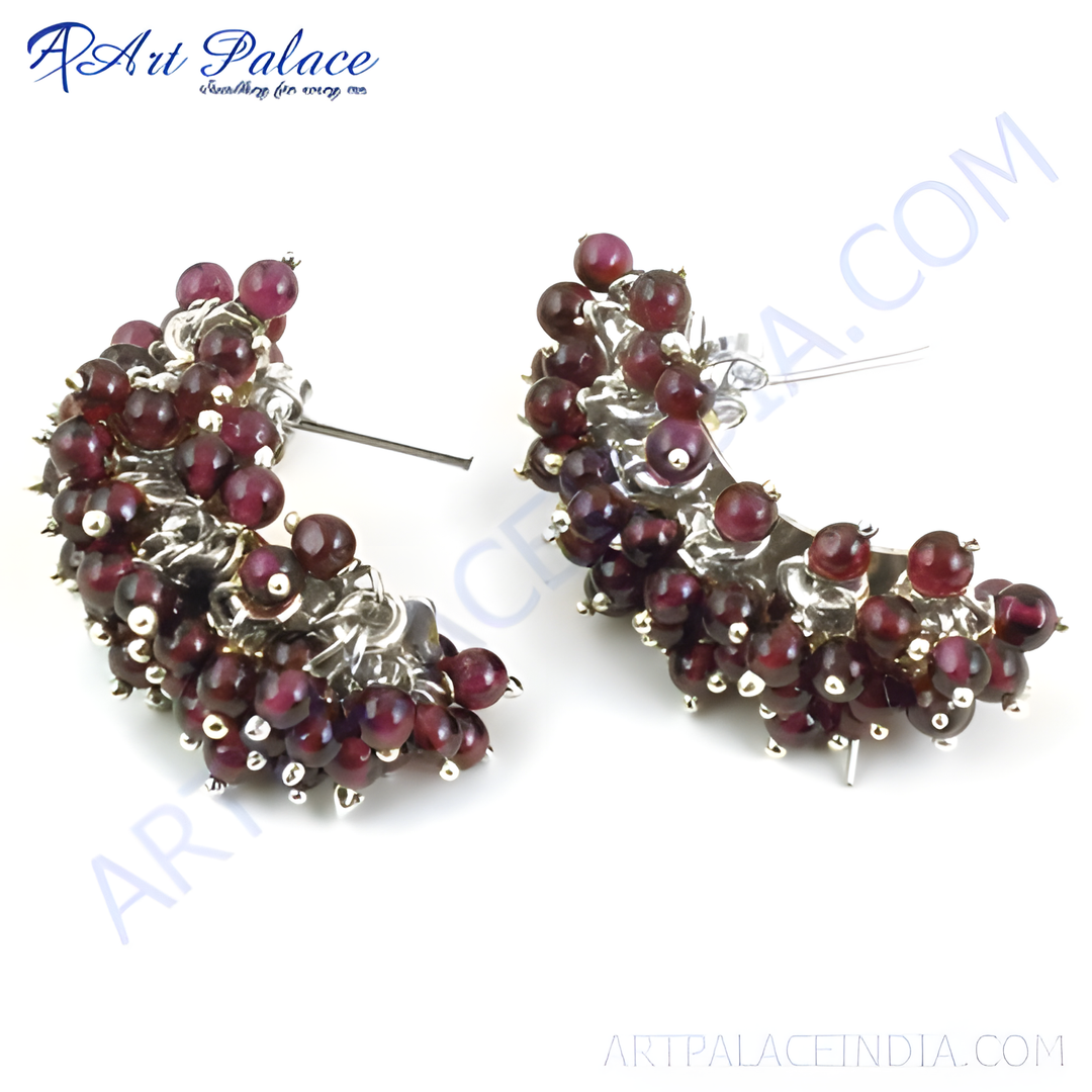 Silver cluster earrings featuring round, deep red garnet gemstones for women.