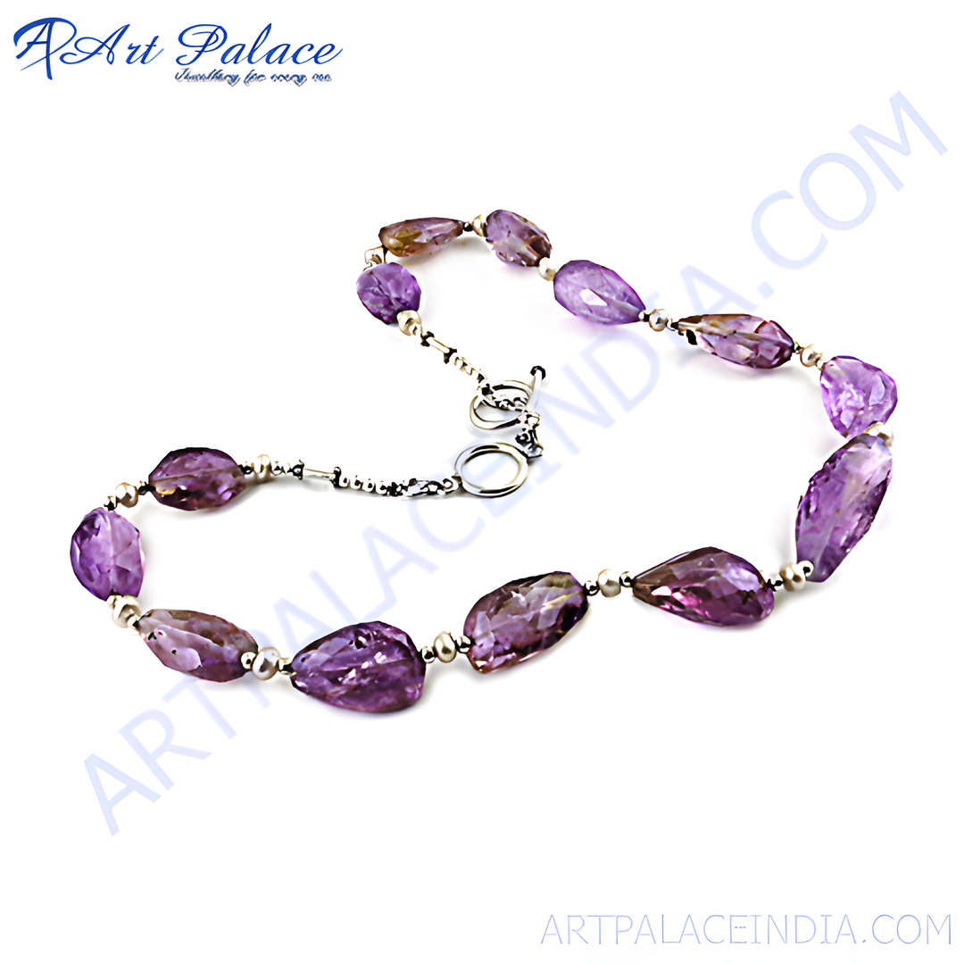 Sterling silver chain necklace featuring faceted purple amethyst gemstones and silver beads.