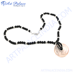Load image into Gallery viewer, Black onyx bead necklace with a pink gemstone pendant, perfect for everyday elegance.
