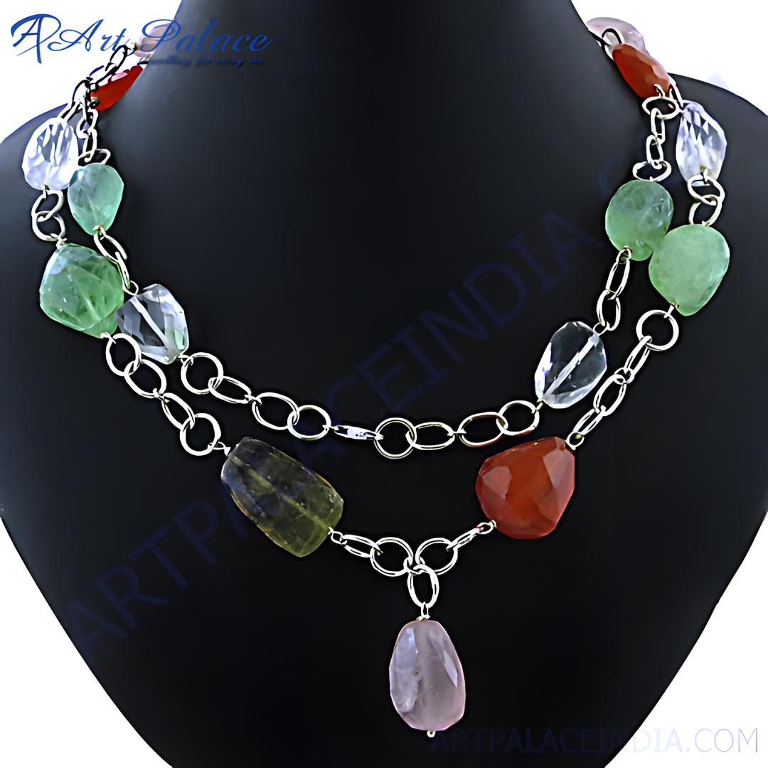 Gemstone beaded necklace with sterling silver chain on a black jewelry display