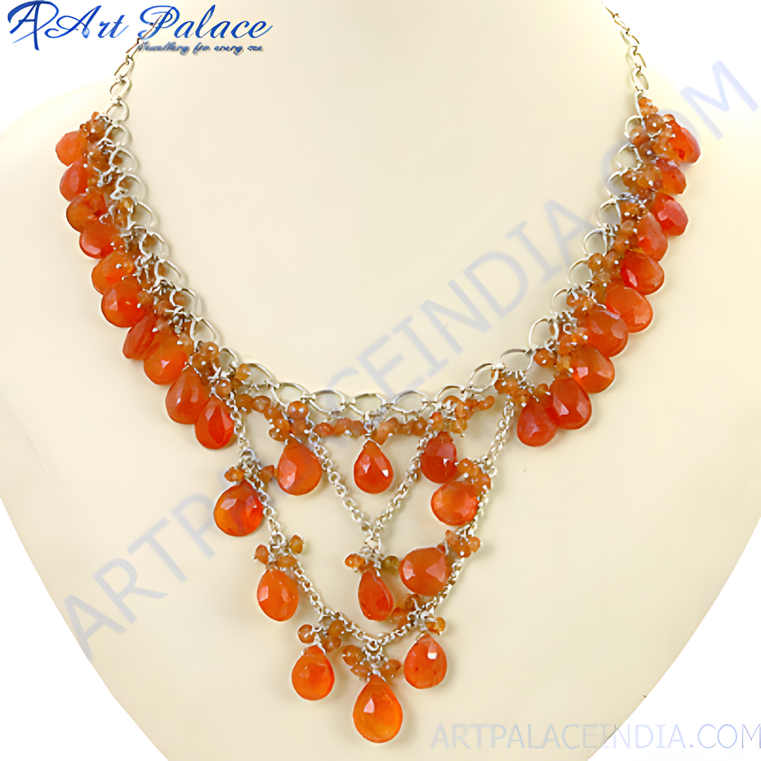 Sterling silver necklace with vibrant orange carnelian gemstone drops, a stunning jewelry piece.