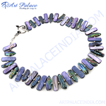 Load image into Gallery viewer, Purple pearl necklace with a silver clasp on a white background, perfect for a special occasion.
