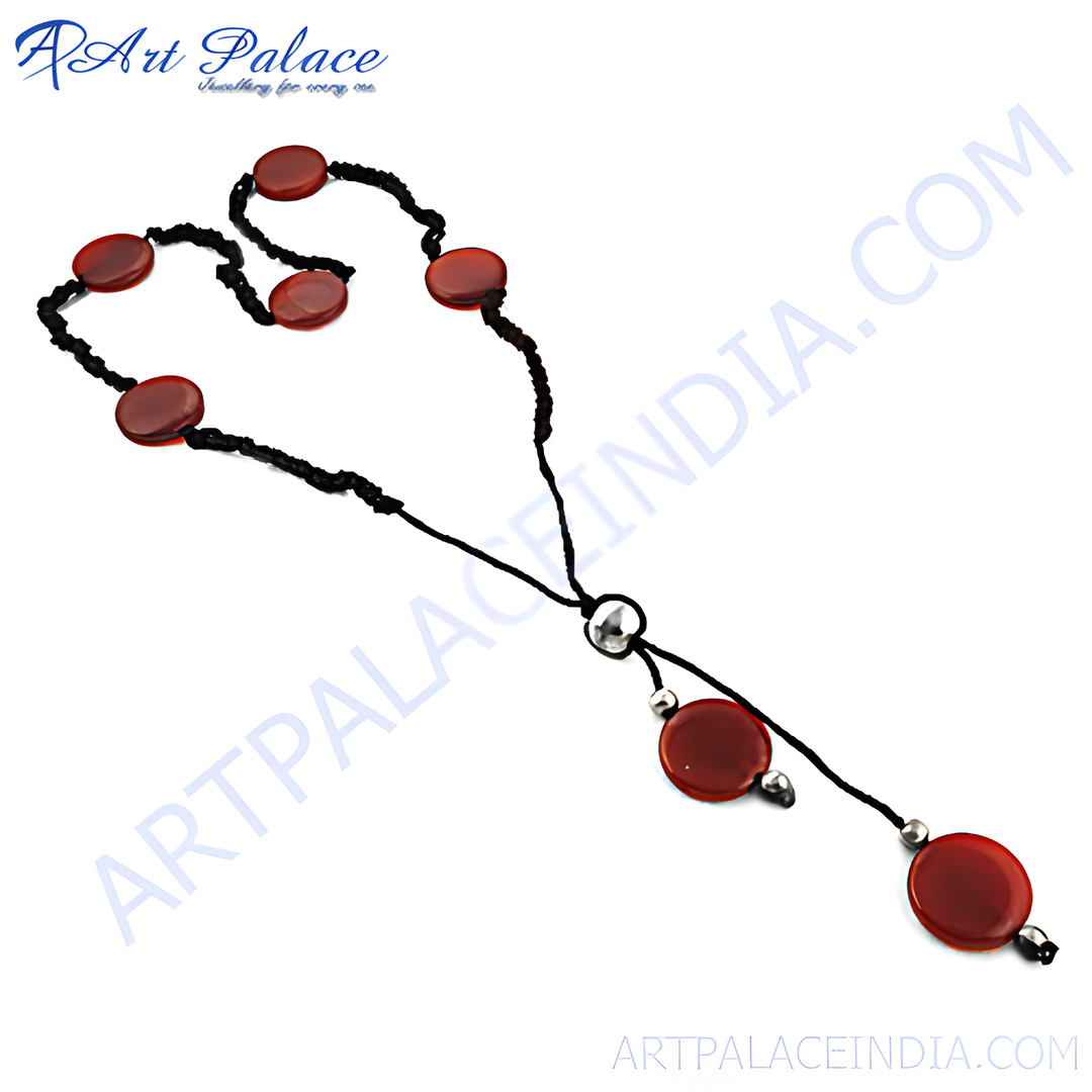 Red stone beaded necklace with black cord and silver accents, women's fashion jewelry.