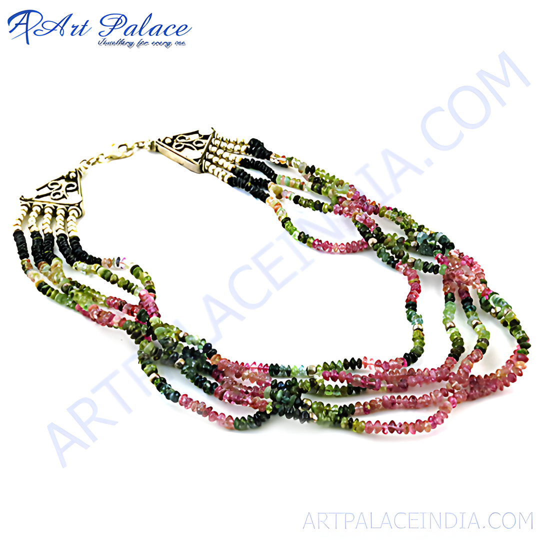 Multi-strand tourmaline bead necklace in various colors with a gold clasp, gemstone jewelry.
