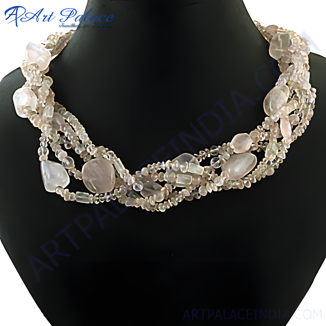 Multi-strand rose quartz beaded necklace with large oval and round beads on a black display.