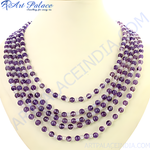 Load image into Gallery viewer, Amethyst beaded necklace with vibrant purple gemstone beads on display, a beautiful women&#39;s jewelry piece.
