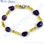 Load image into Gallery viewer, Amethyst and citrine bead necklace with purple and yellow gemstones on a white background
