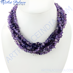 Load image into Gallery viewer, Amethyst chip bead necklace displayed on a white bust, showcasing the purple gemstones.
