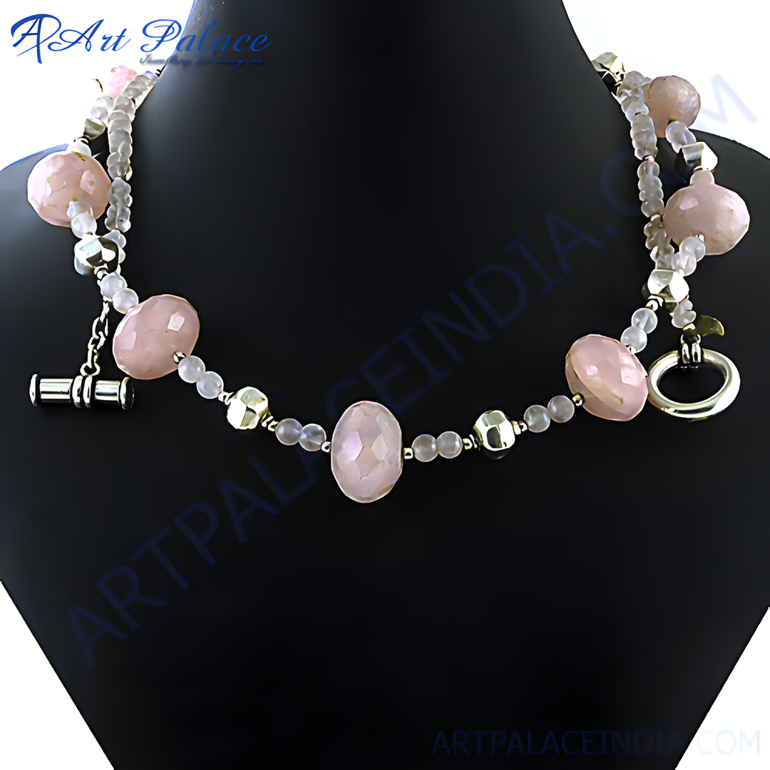 Rose quartz beaded necklace with silver accents and toggle clasp, gemstone jewelry.