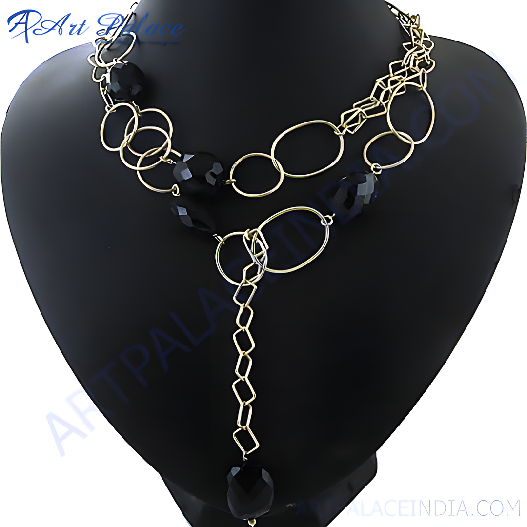 Black beaded lariat necklace with gold chain, a stylish fashion jewelry piece for women.