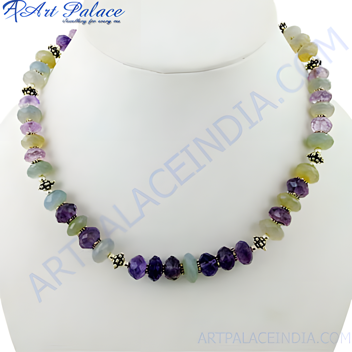 A beaded necklace featuring purple and green gemstones strung together on a necklace