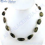 Load image into Gallery viewer, Smoky quartz and pearl beaded necklace on a white background. Dark gray gemstone beads and white pearl beads.
