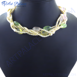 Load image into Gallery viewer, Braided necklace with pearls and green, and pink gemstones on a black background. Fashion statement necklace.
