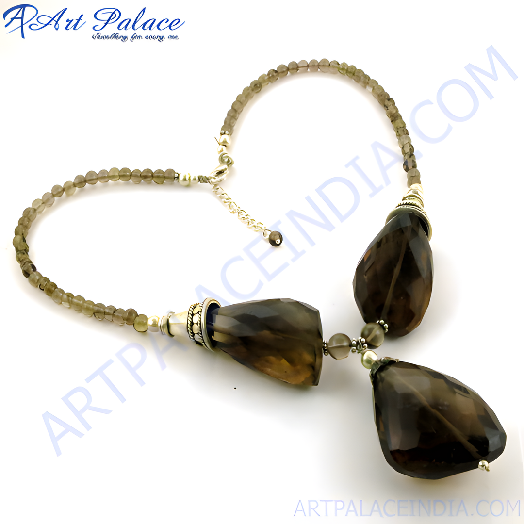 Smoky quartz beaded necklace with sterling silver accents. Brown gemstones and silver metal jewelry.