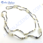Load image into Gallery viewer, Iolite and iriodine gemstone and pearl beaded necklace on a white background, gemstone necklace
