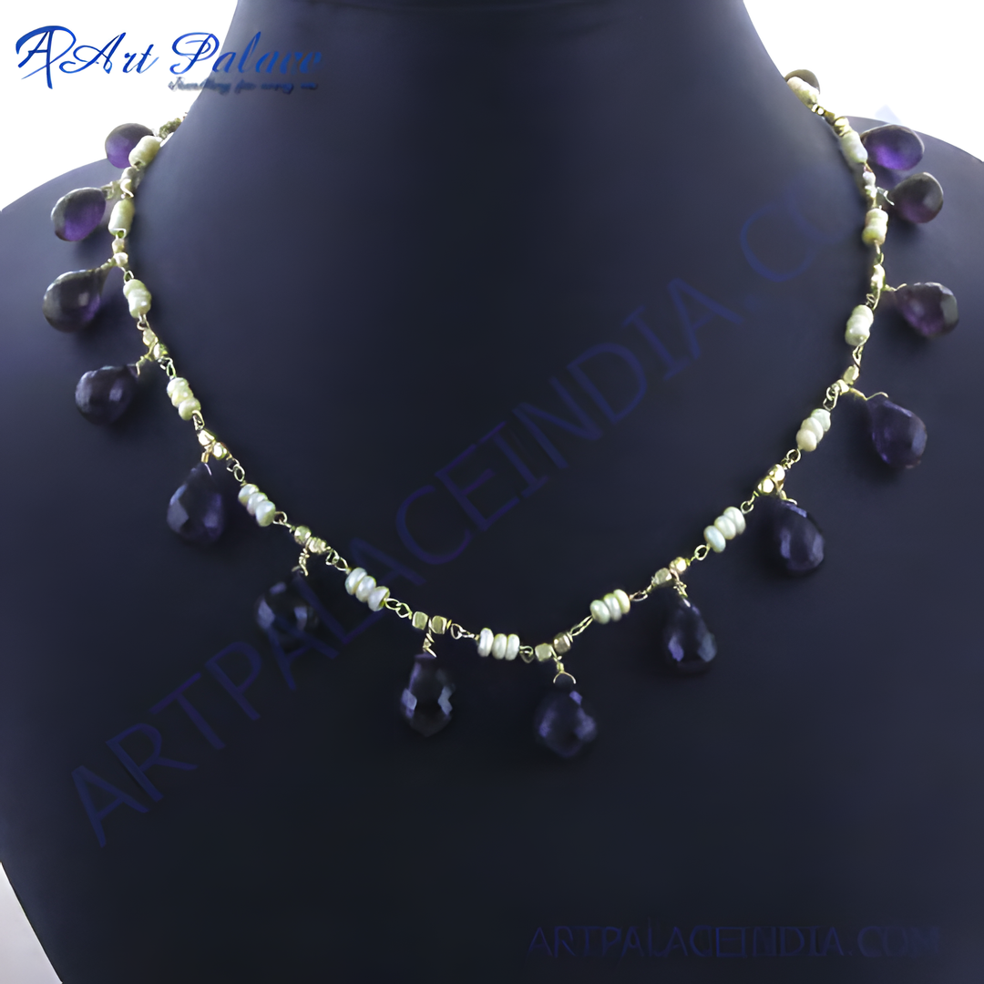 Amethyst and pearl beaded necklace with gold chain, featuring teardrop-shaped purple gemstones and white pearls.