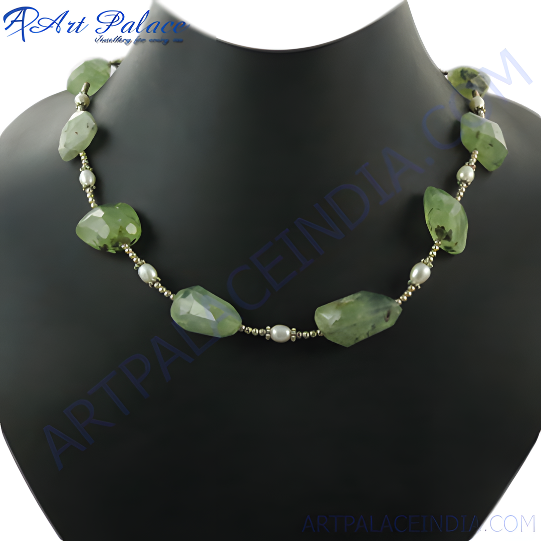 A stunning green jade and pearl beaded necklace displayed on a black mannequin.