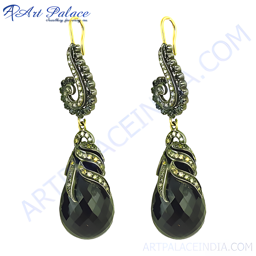 Black onyx drop earrings with a detailed design, showcasing the gemstone and the intricate metalwork.