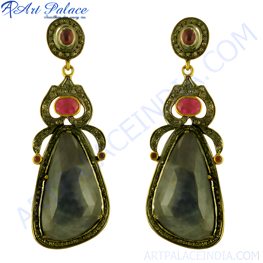 gold plating-plated drop earrings with a large faceted sapphire and ruby accents.
