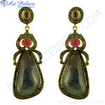 Load image into Gallery viewer, gold plating-plated drop earrings with a large faceted sapphire and ruby accents.
