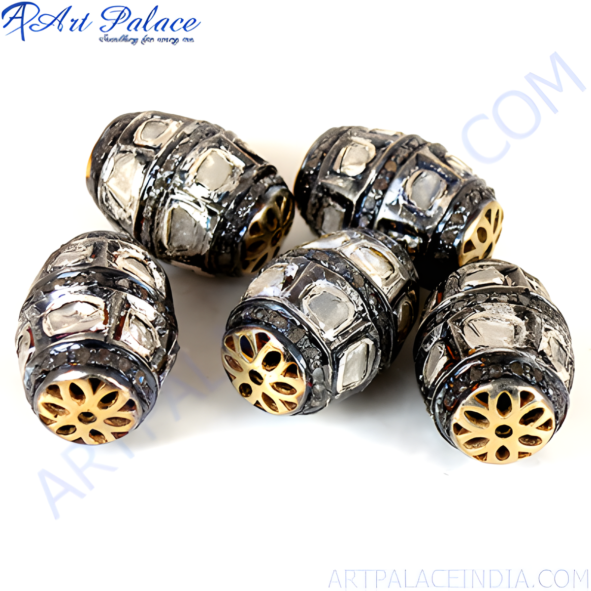 Close up of diamond cut beads in silver and gold plating, perfect for jewelry making, with intricate details