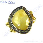 Load image into Gallery viewer, Gold ring with a large yellow sapphire center stone and diamond accents around the edge.
