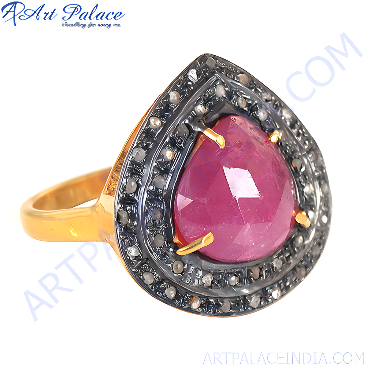 Gold plating ruby and diamond ring featuring a pear cut ruby with a halo of small diamonds, ideal for engagement