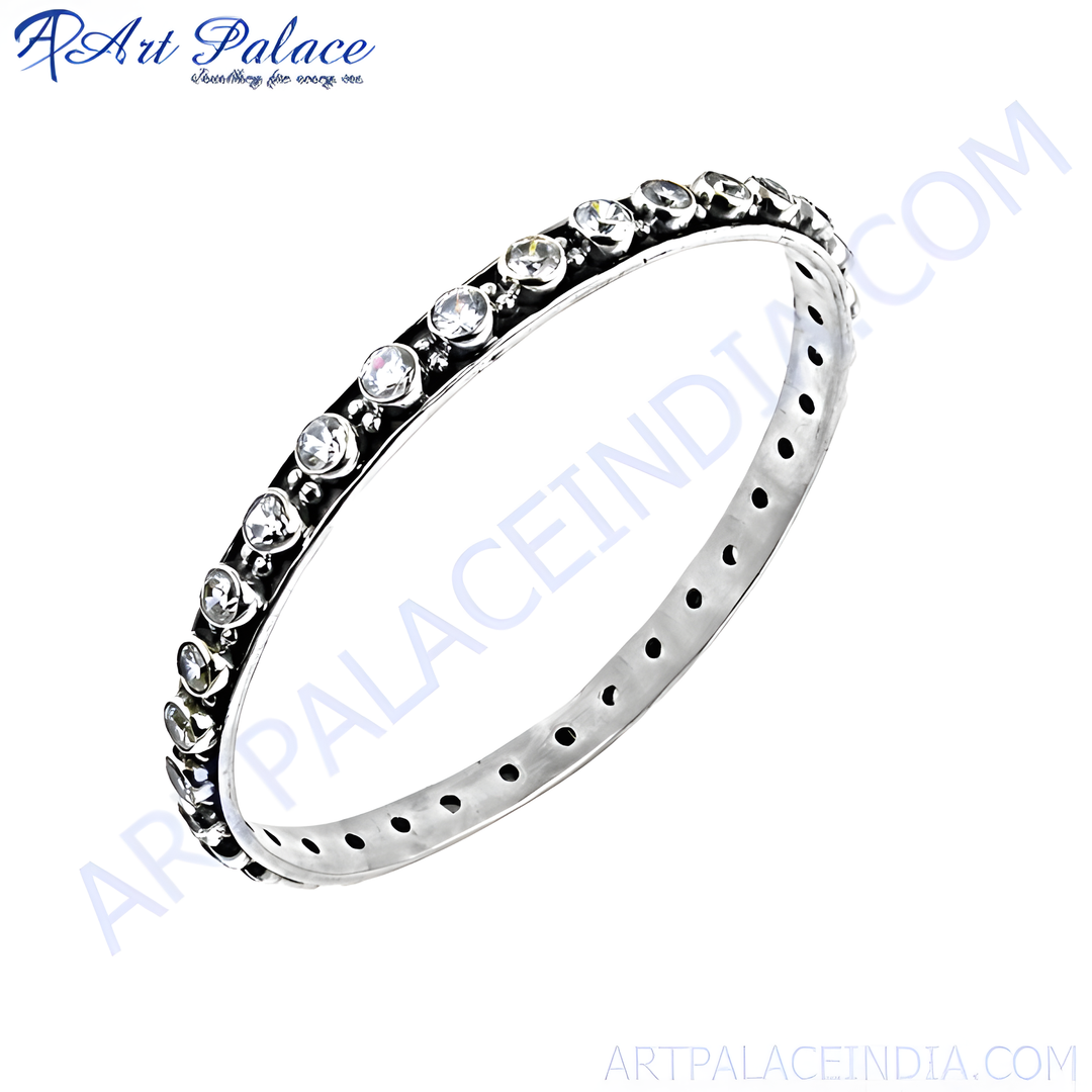 Silver bangle bracelet with round white cubic zirconia stones, daily wear jewelry.