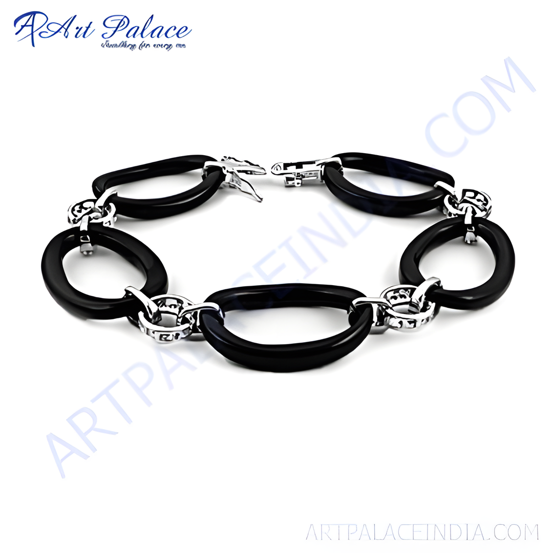 Silver and black oval link bracelet with polished black links and silver connectors.