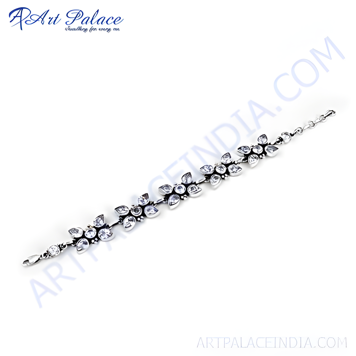 Sterling silver chain bracelet with flower design, featuring clear cubic zirconia stones