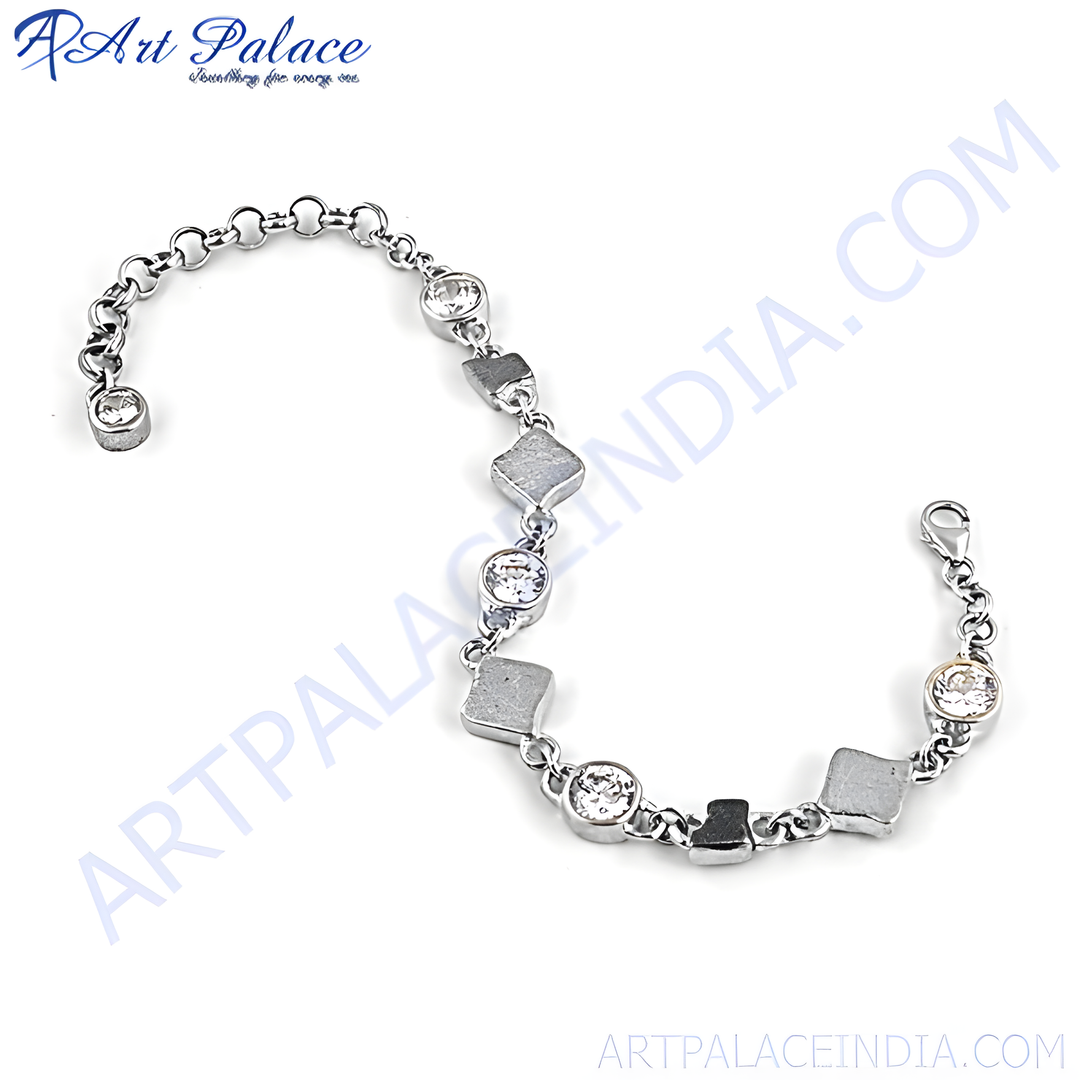 Silver chain bracelet with round cubic zirconia and geometric details.
