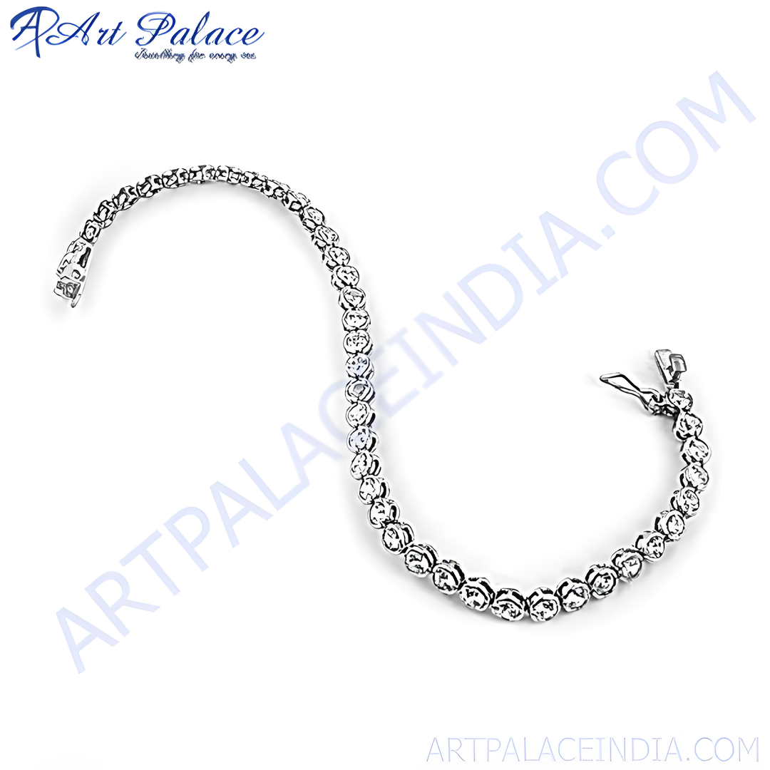 925 silver tennis bracelet with round brilliant-cut cubic zirconia stones on a white background.