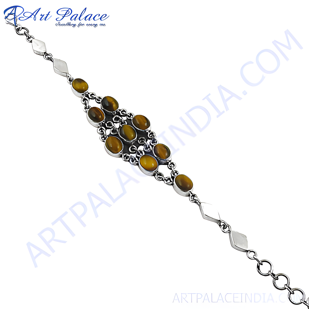 Sterling silver bracelet featuring oval tiger eye gemstones in a silver chain setting.