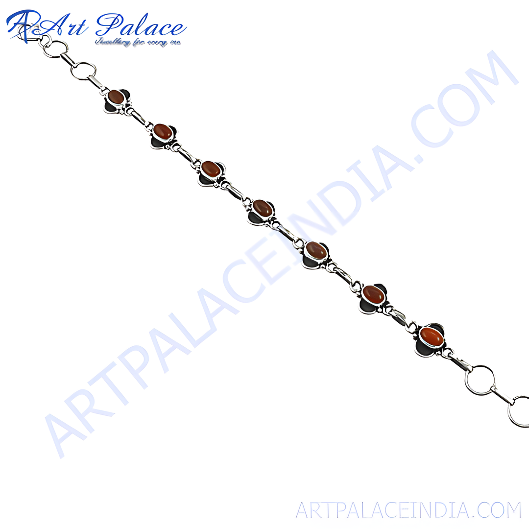 925 sterling silver chain bracelet with oval-cut carnelian gemstones.