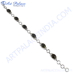 Load image into Gallery viewer, 925 sterling silver chain bracelet with oval-shaped black onyx stones, perfect for elegant wear.
