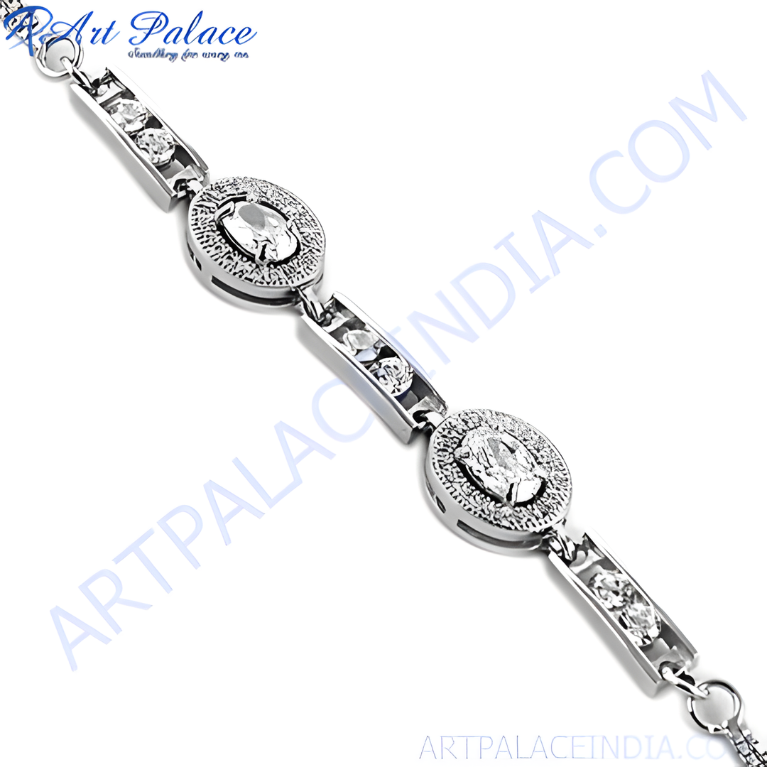 Silver bracelet with sparkling CZ stones. Features an oval-shaped design with a secure clasp.