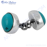Load image into Gallery viewer, Sterling silver cufflinks with oval turquoise stones and a chain link.
