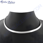 Load image into Gallery viewer, A sleek silver collar necklace displayed on a black mannequin, showcasing its minimalist design.
