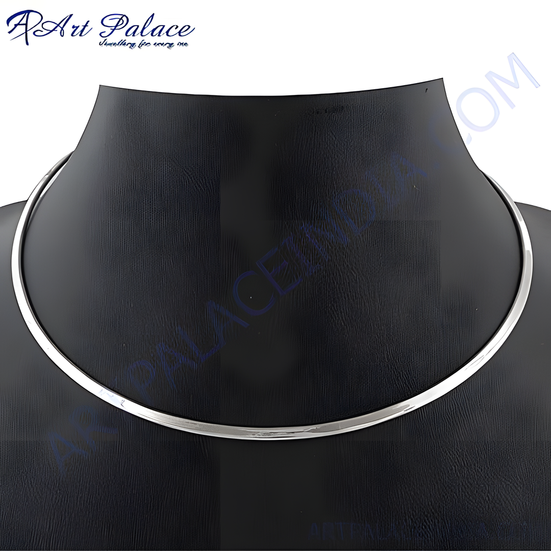 Silver collar necklace displayed on a black mannequin. The polished silver reflects light beautifully.