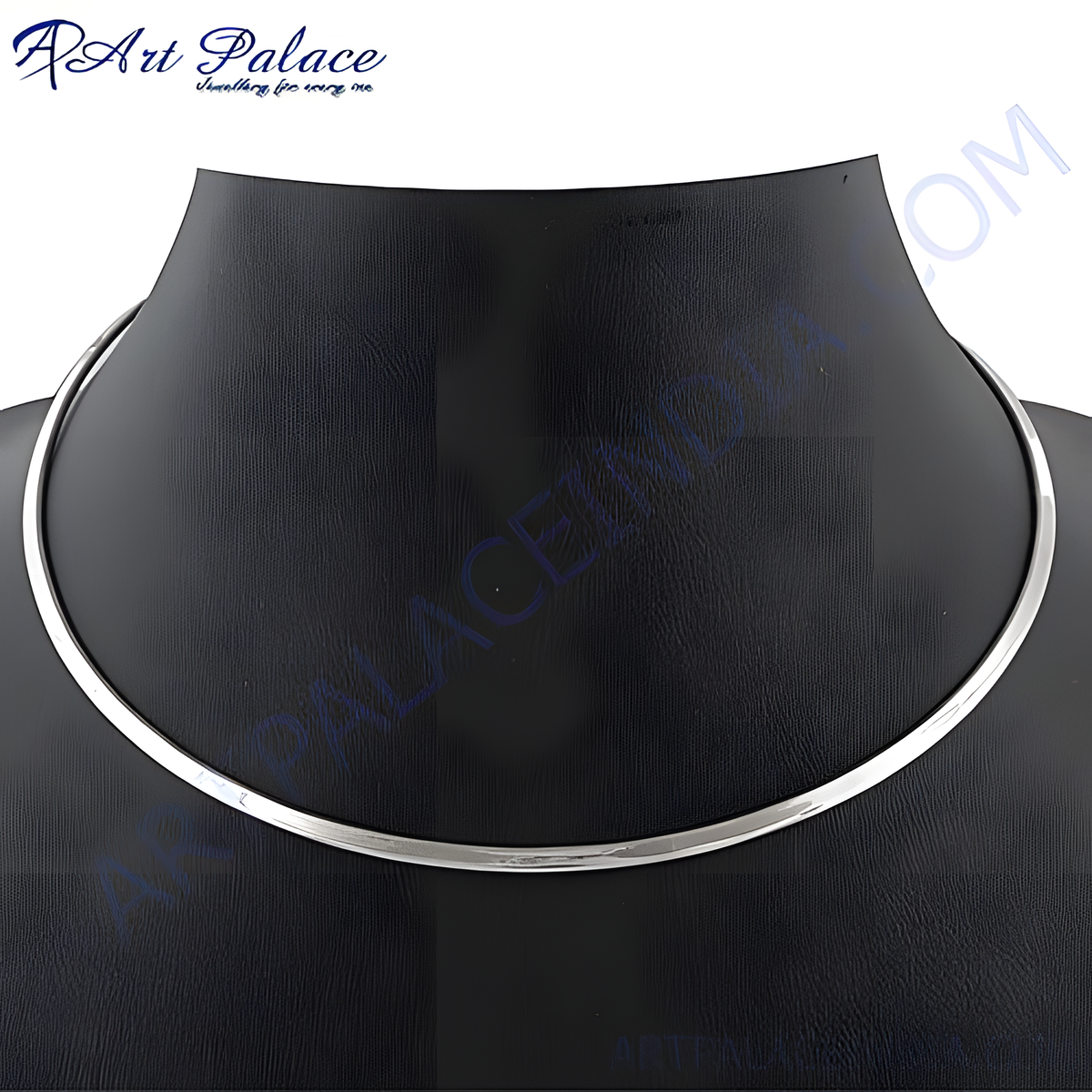 Silver collar necklace displayed on a black mannequin