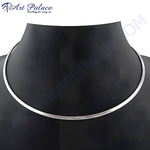 Load image into Gallery viewer, Silver collar necklace displayed on a black mannequin. The polished silver reflects light beautifully.
