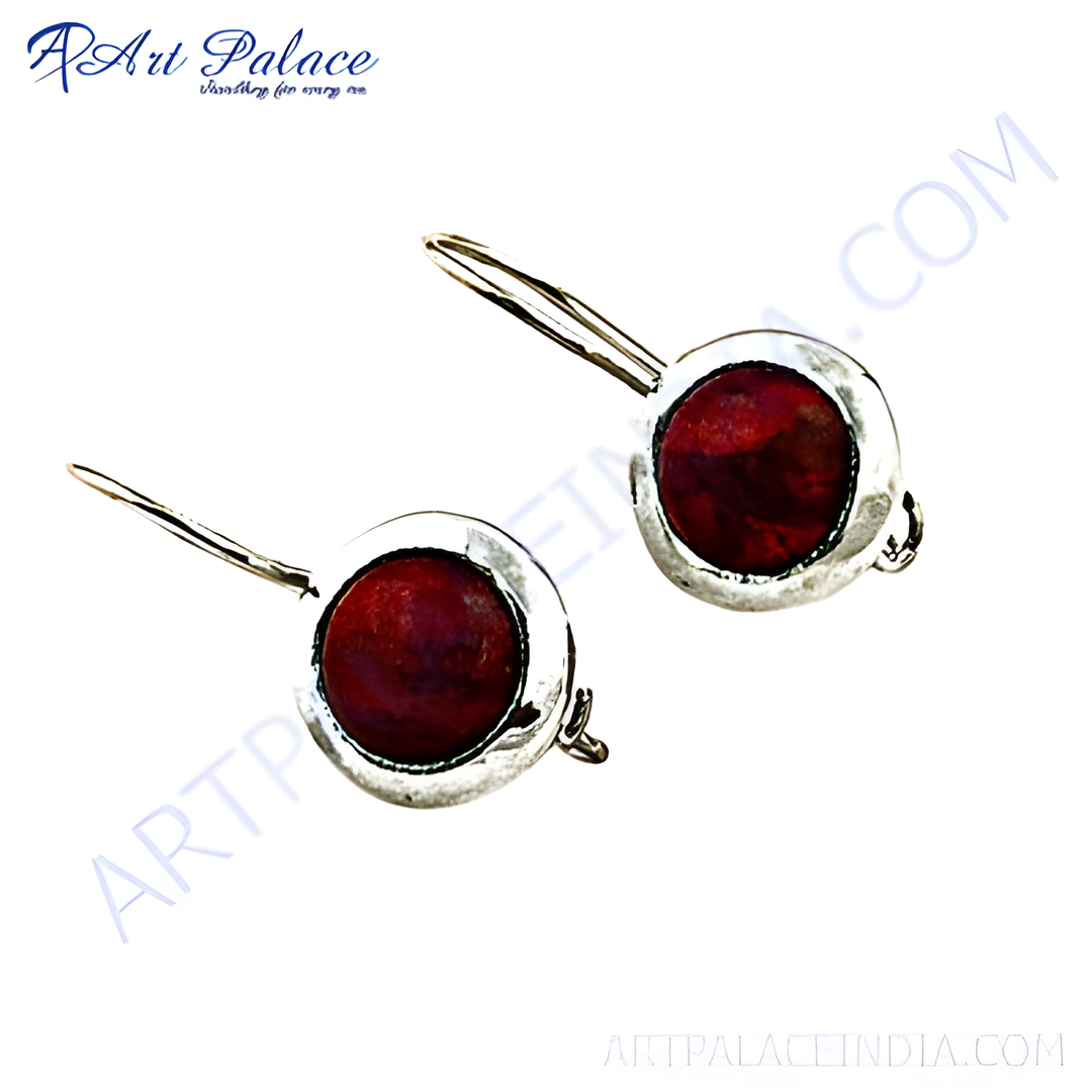 Silver drop earrings with a round red stone center, set in a silver bezel, perfect for daily wear.