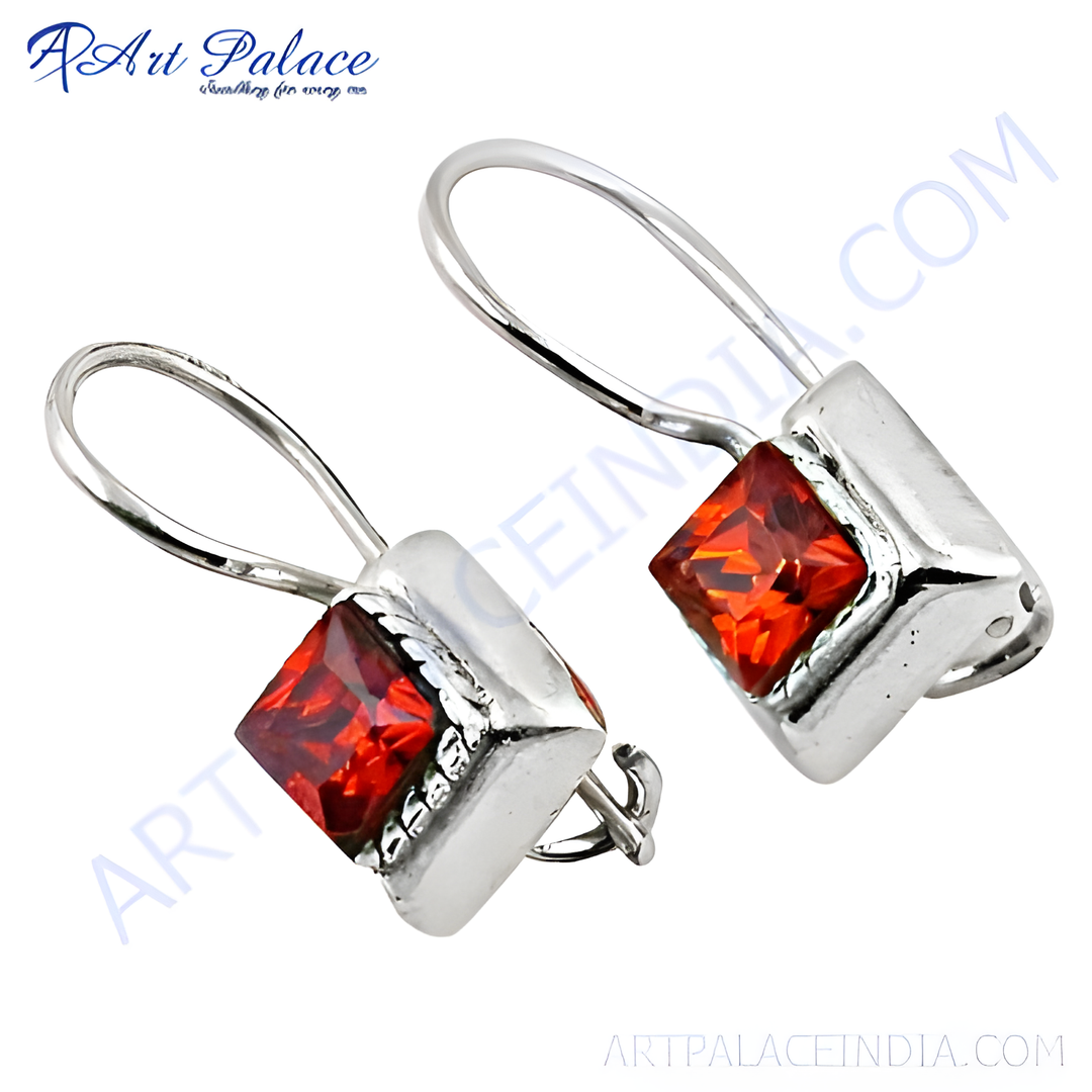 Silver drop earrings with square-cut red gemstones set in a polished silver frame, perfect for everyday wear.
