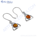 Load image into Gallery viewer, Sterling silver dangle earrings with amber gemstone in Celtic knot design.
