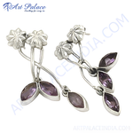 Load image into Gallery viewer, 925 sterling silver dangle earrings with amethyst gemstone accents and a flower design.
