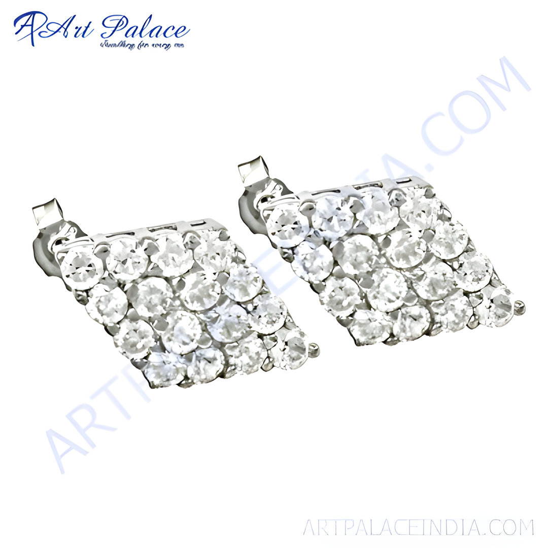 Silver stud earrings with round-cut cubic zirconia stones, perfect for daily wear.