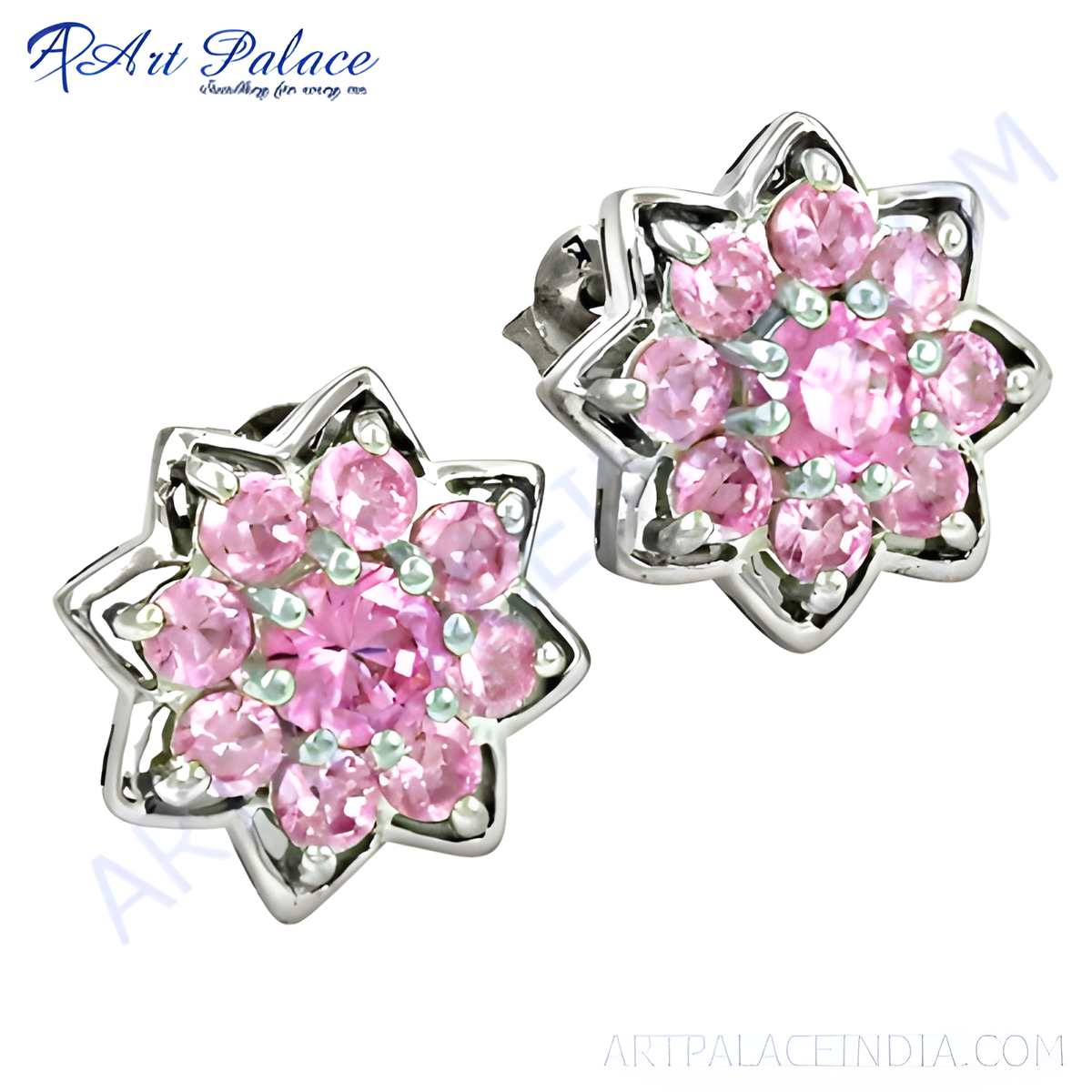 Sterling silver stud earrings featuring a flower design with pink sapphire gemstones in a cluster